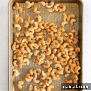 cashews on baking sheet.