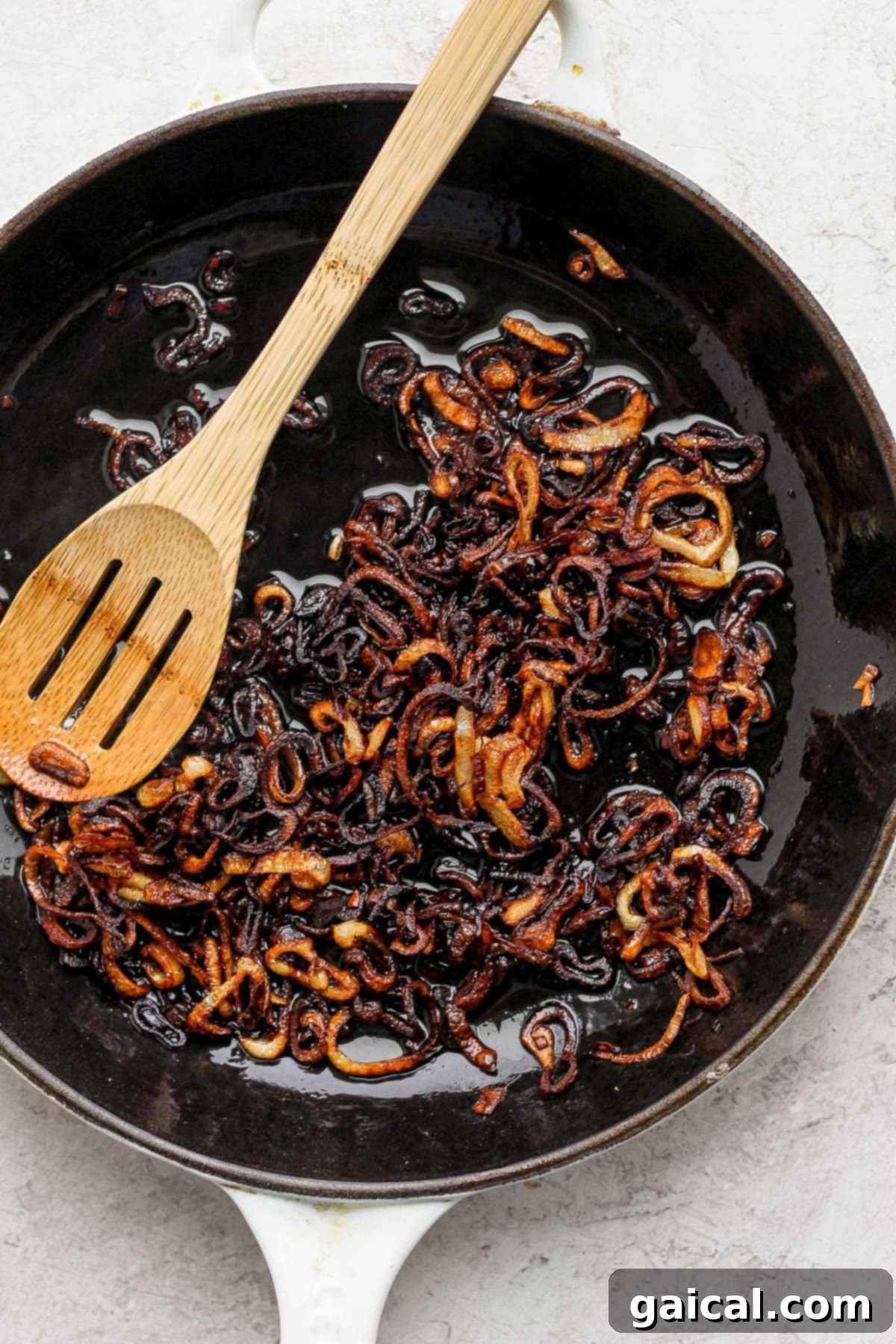 Shallots frying in pan. 