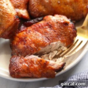 Perfectly Smoked Chicken Thighs 9 Smoked chicken thighs on a plate