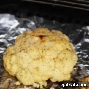 a close up of a piece of food on tin foil.