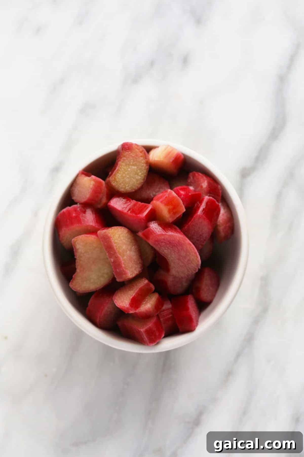 Sweet and Tangy Rhubarb Muffins 3 A bowl full of rhubarb chunks.