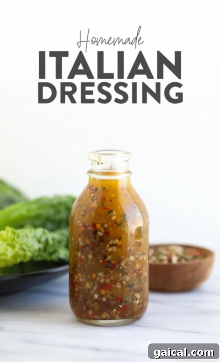 Easy Homemade Italian Dressing 2 Homemade Italian dressing in a glass jar, ready to be served.