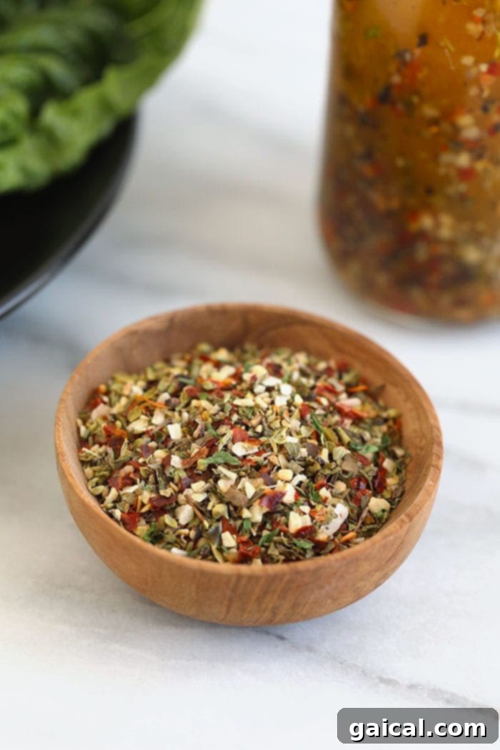 Easy Homemade Italian Dressing 3 A small bowl filled with homemade Italian seasoning blend.