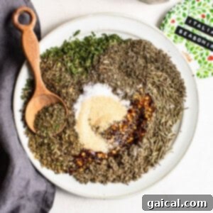 Easy Homemade Italian Dressing 4 Italian seasoning on a plate, highlighting the blend of herbs and spices.