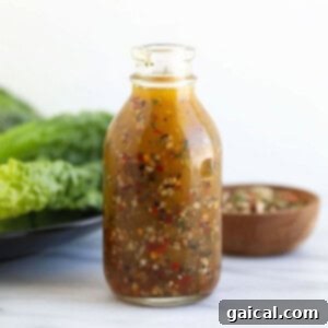 Easy Homemade Italian Dressing 6 Homemade Italian dressing in a stylish glass bottle, ready for use.