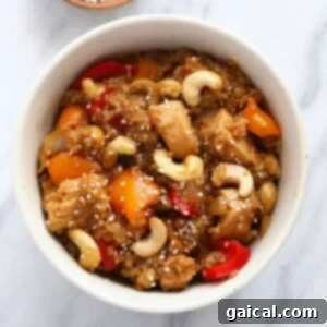 A Cashew Chicken Casserole with vegetables and cashews.