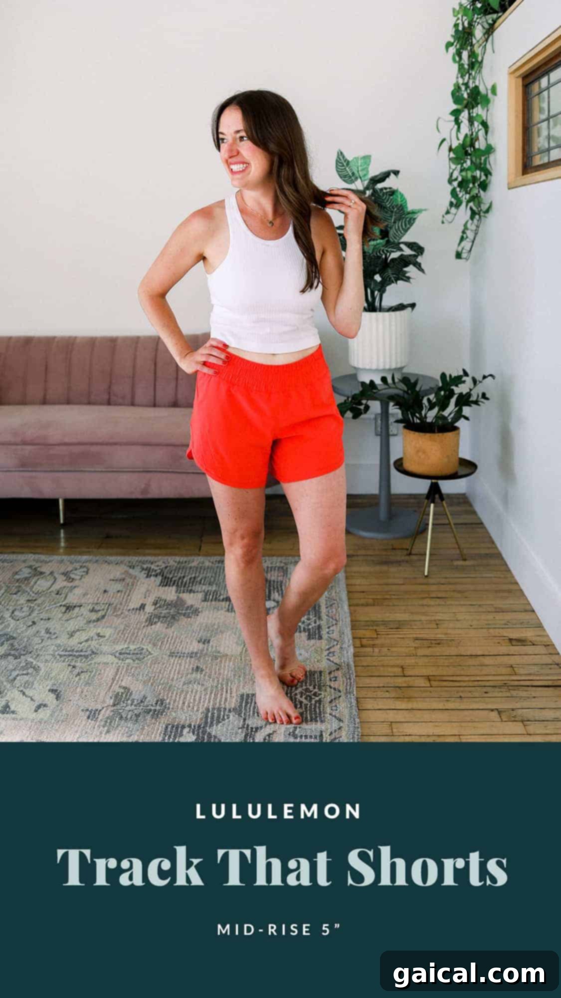 Linley showcasing the vibrant red Lululemon Track That Mid-Rise Shorts, perfect for running with a wide leg opening and practical pockets.