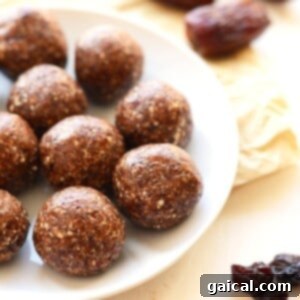a plate full of cherry pie energy balls.