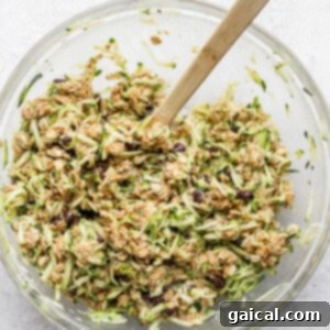 Cookie dough with zucchini in a bowl.