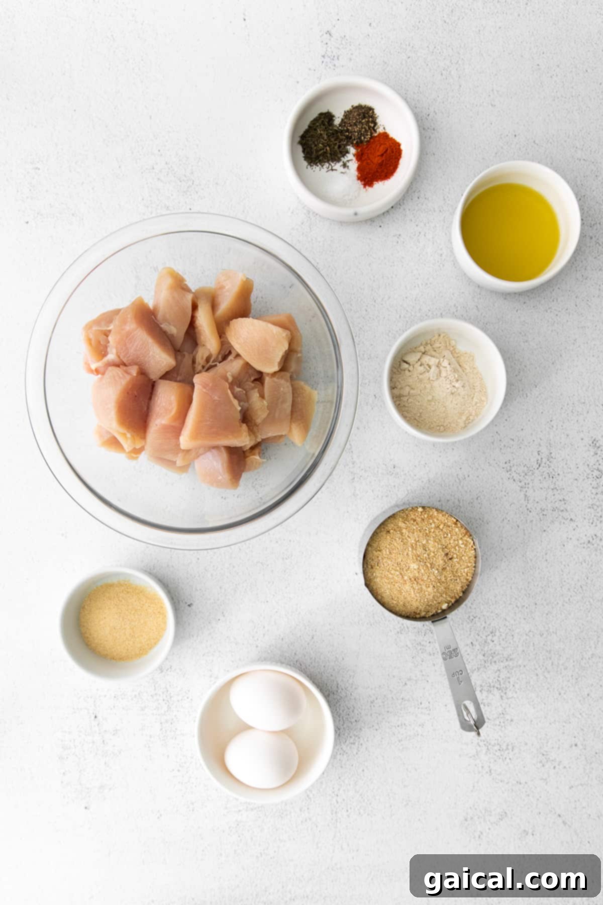 Perfectly Crispy Air Fryer Nuggets 3 All the ingredients for air fryer chicken nuggets on the counter.