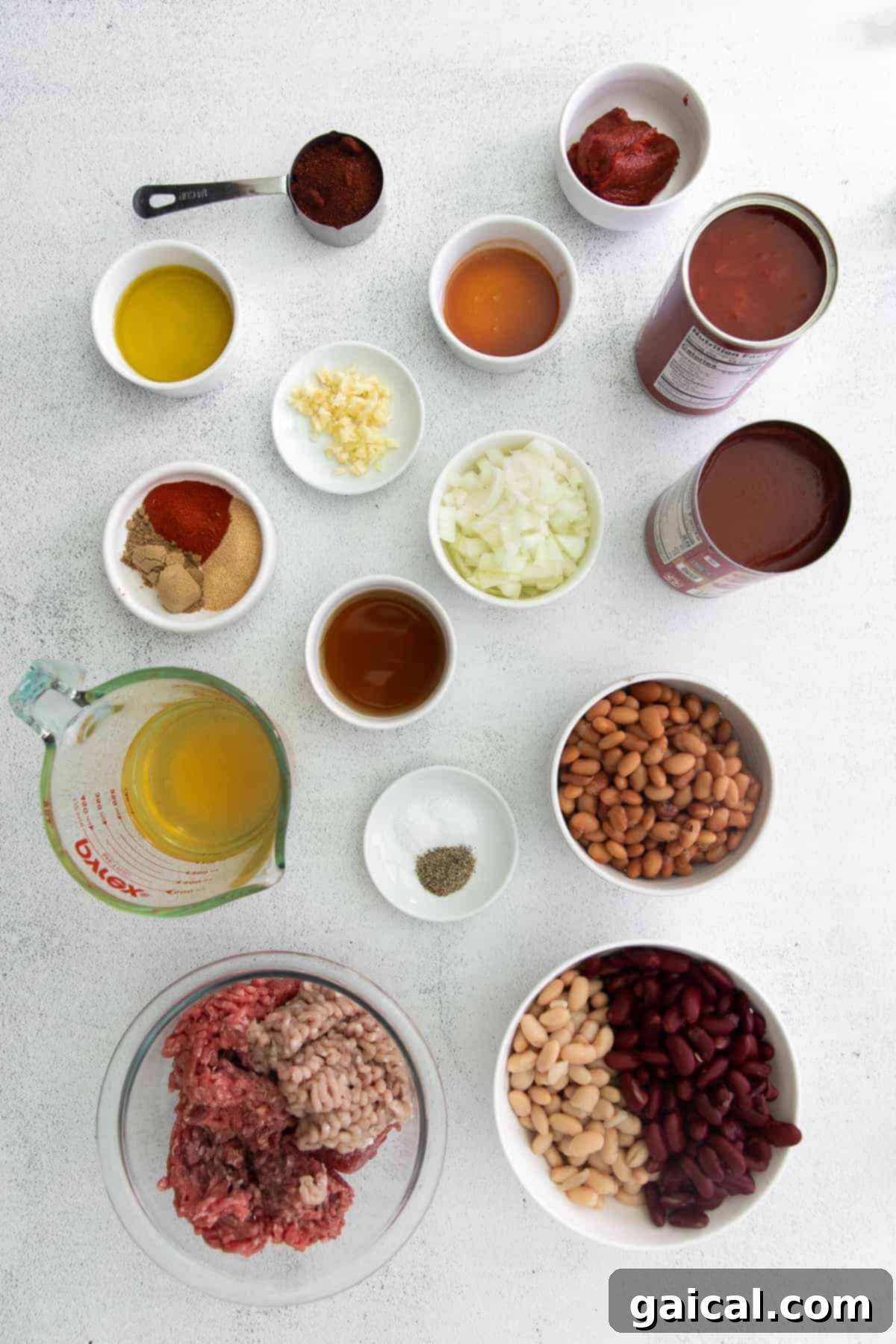 A collection of fresh Instant Pot chili ingredients neatly arranged in bowls, ready to be combined.