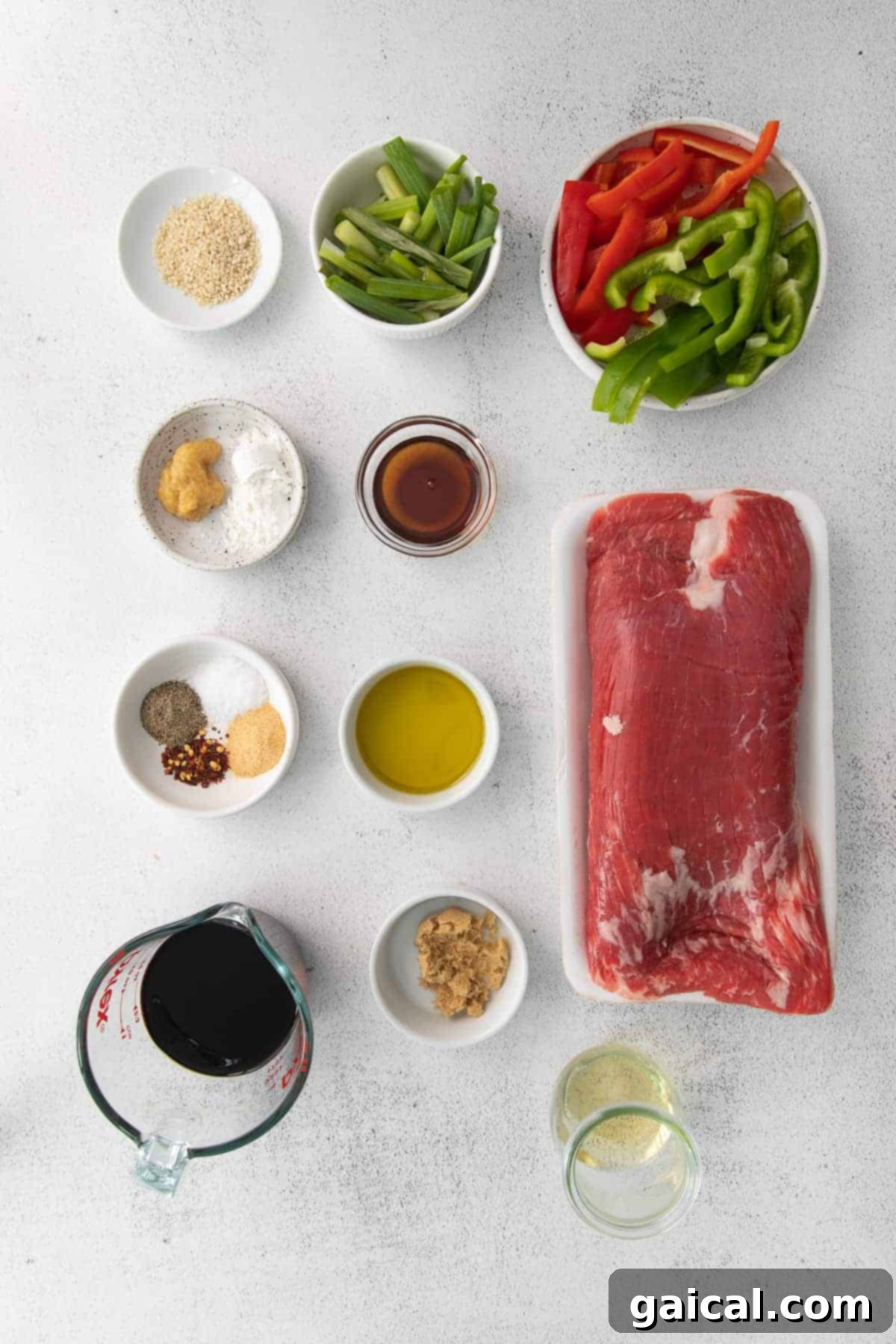 Sizzling Pepper Steak 4 all the ingredients for pepper steak in small bowls.