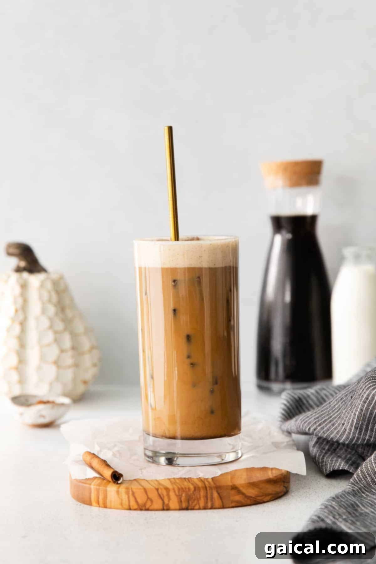 A tall glass of homemade Pumpkin Cream Cold Brew, perfectly mixed and ready to enjoy.