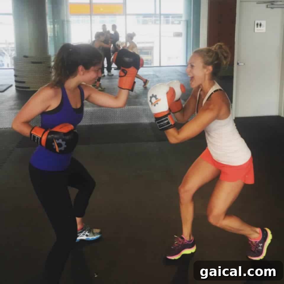 Friends celebrating a tough but rewarding workout at Fit Factory gym in Toronto