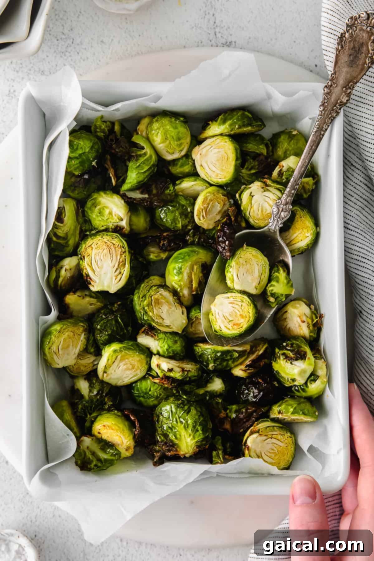 Perfectly Crisp Air-Fried Brussels 2 Air Fryer Brussel sprouts in a pan