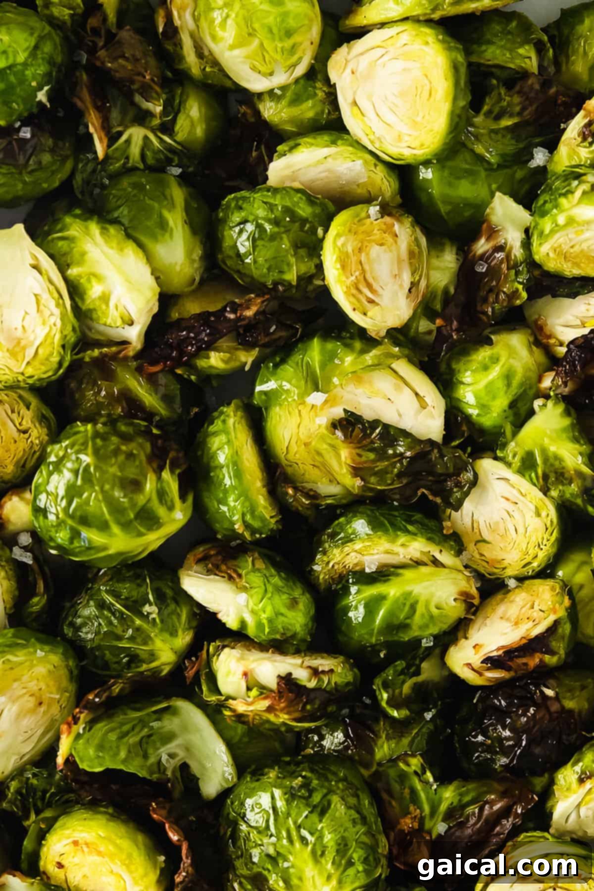 Perfectly Crisp Air-Fried Brussels 7 Brussel sprouts sprinkled with sea salt.