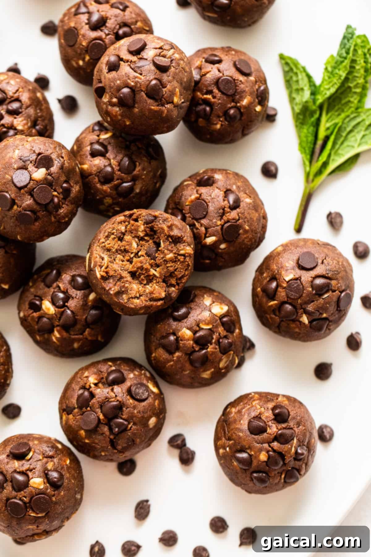 Mint Chip Protein Balls: The Ultimate Healthy Snack A beautifully arranged platter of homemade Mint Chip Protein Balls, featuring a vibrant green hue with visible chocolate chips, ready for a healthy snack.