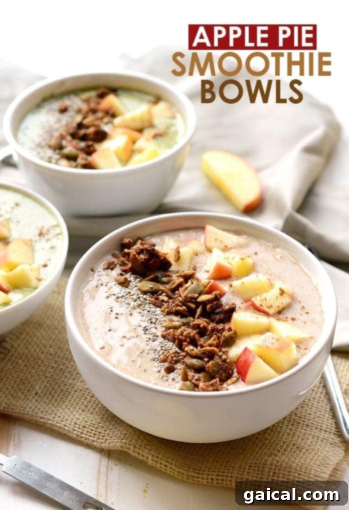 Delicious apple pie smoothie bowl with a variety of healthy toppings, resembling a comforting dessert for breakfast.