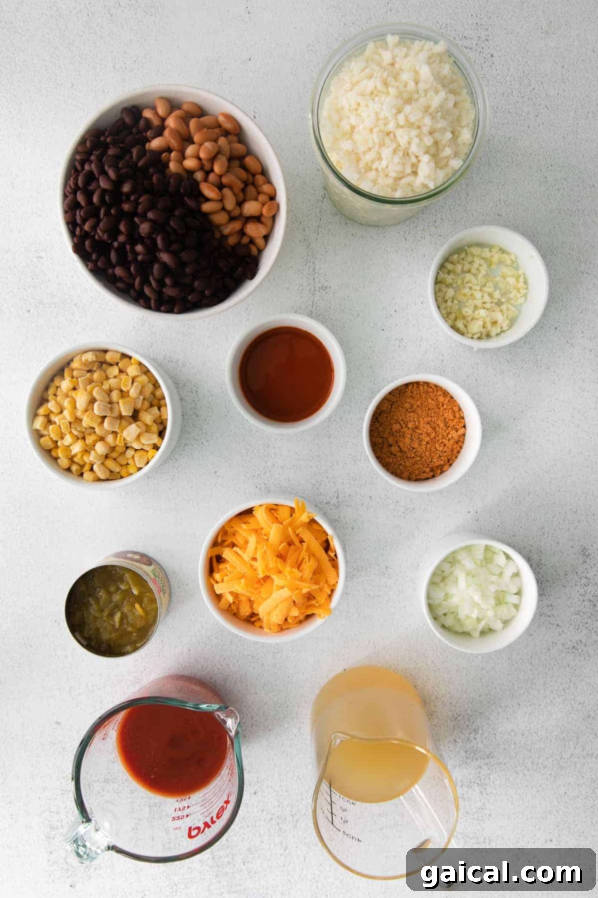 Essential ingredients for cauliflower taco skillet laid out on a kitchen counter.