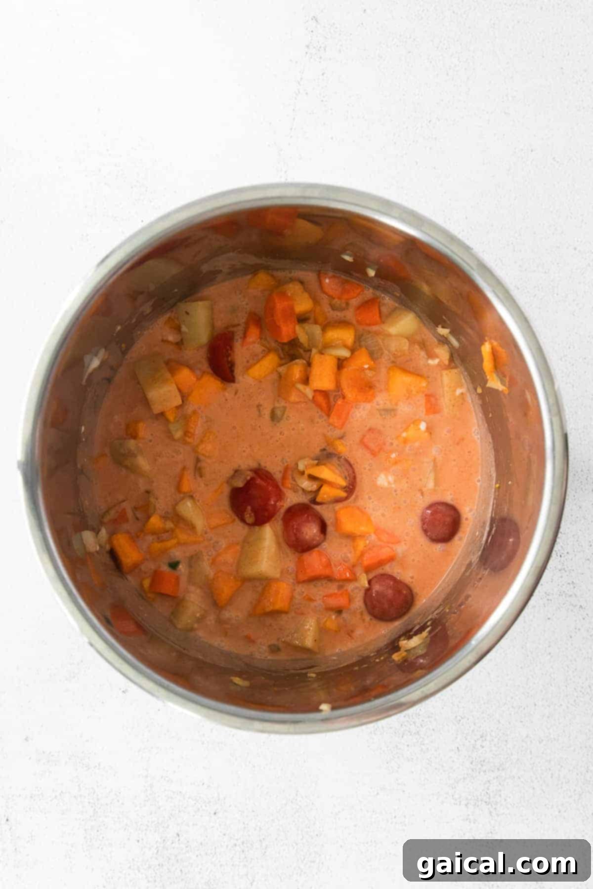 Flavorful Instant Pot Pumpkin Curry 5 Close-up of Instant Pot filled with vibrant Thai pumpkin curry, showcasing its rich texture and colorful vegetables, ready to be served.