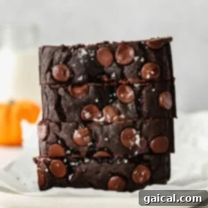 A stack of chocolate pumpkin bread.