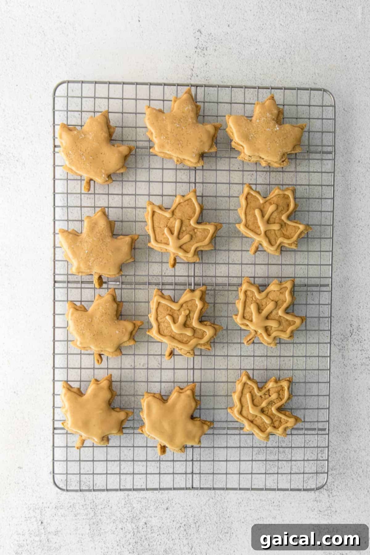 Cooling Maple Sugar Cookies Freshly baked maple cookies cooling on a wire rack, emitting a delightful aroma.