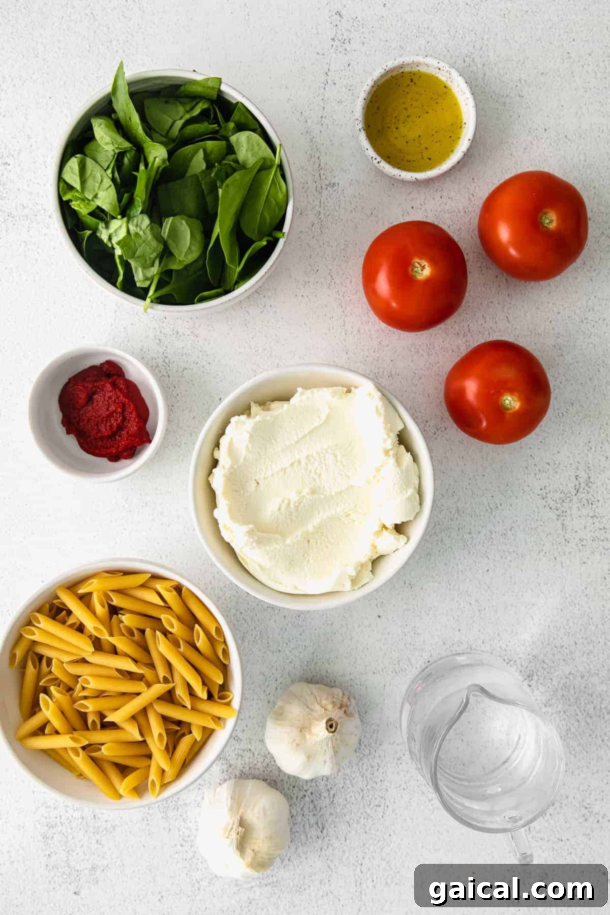 Fresh Ingredients for Whipped Ricotta Pasta Assorted fresh ingredients for whipped ricotta pasta laid out on a clean kitchen countertop