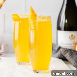 A simple mimosa cocktail in a glass, ready to be served and enjoyed at brunch.
