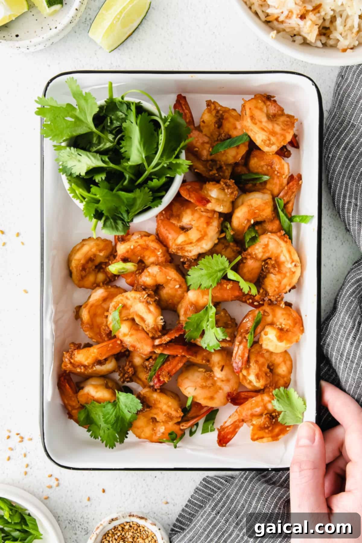 Zesty Lemon Garlic Shrimp 2 Perfectly cooked sautéed shrimp glistening in a pan, ready to be served.