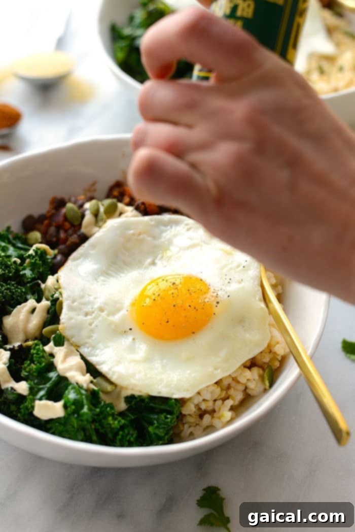 Several black bean breakfast bowls neatly portioned into meal prep containers, ideal for healthy eating throughout the week.