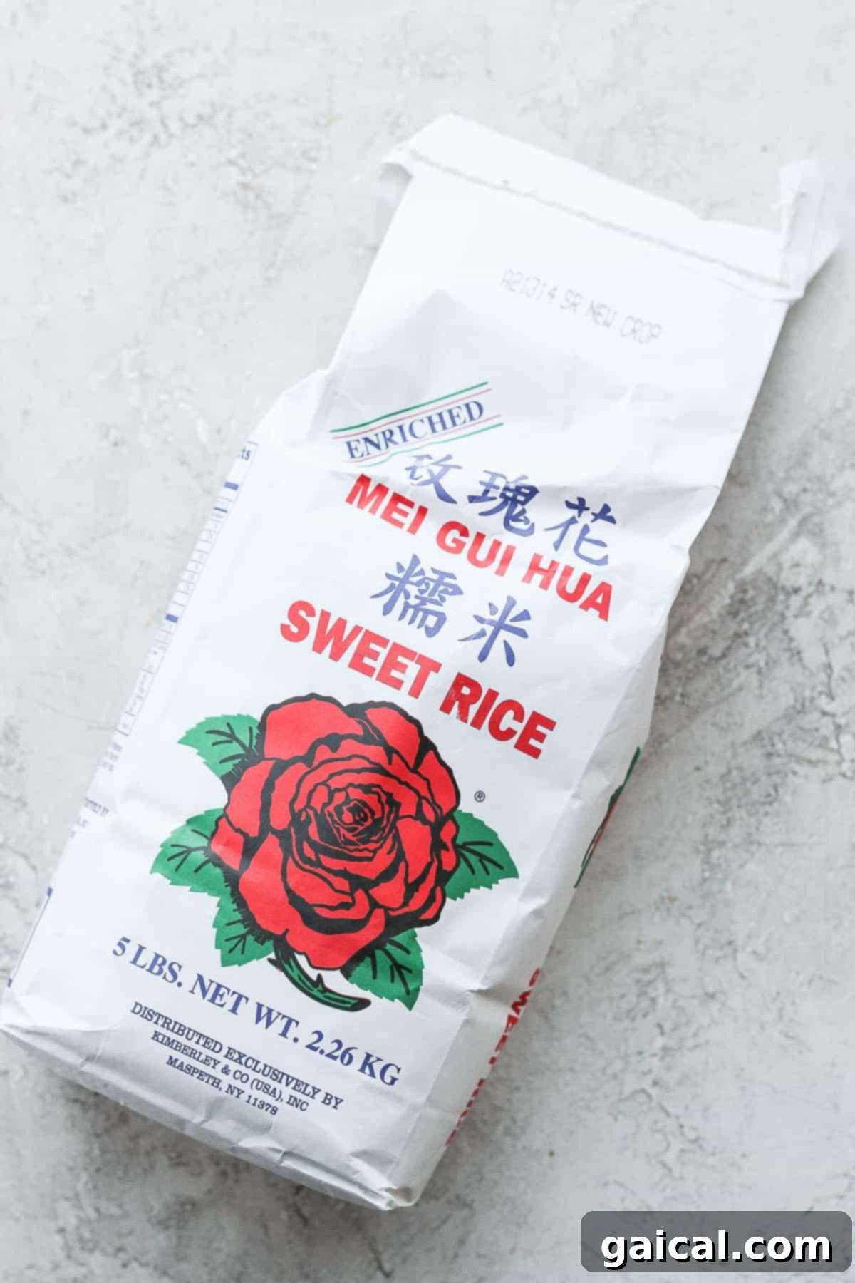 A close-up shot of a bag of sweet glutinous rice, an essential ingredient for authentic sticky rice.