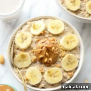 A bowl of overnight oats with peanut butter and banana slices, ready to be enjoyed as a healthy breakfast.