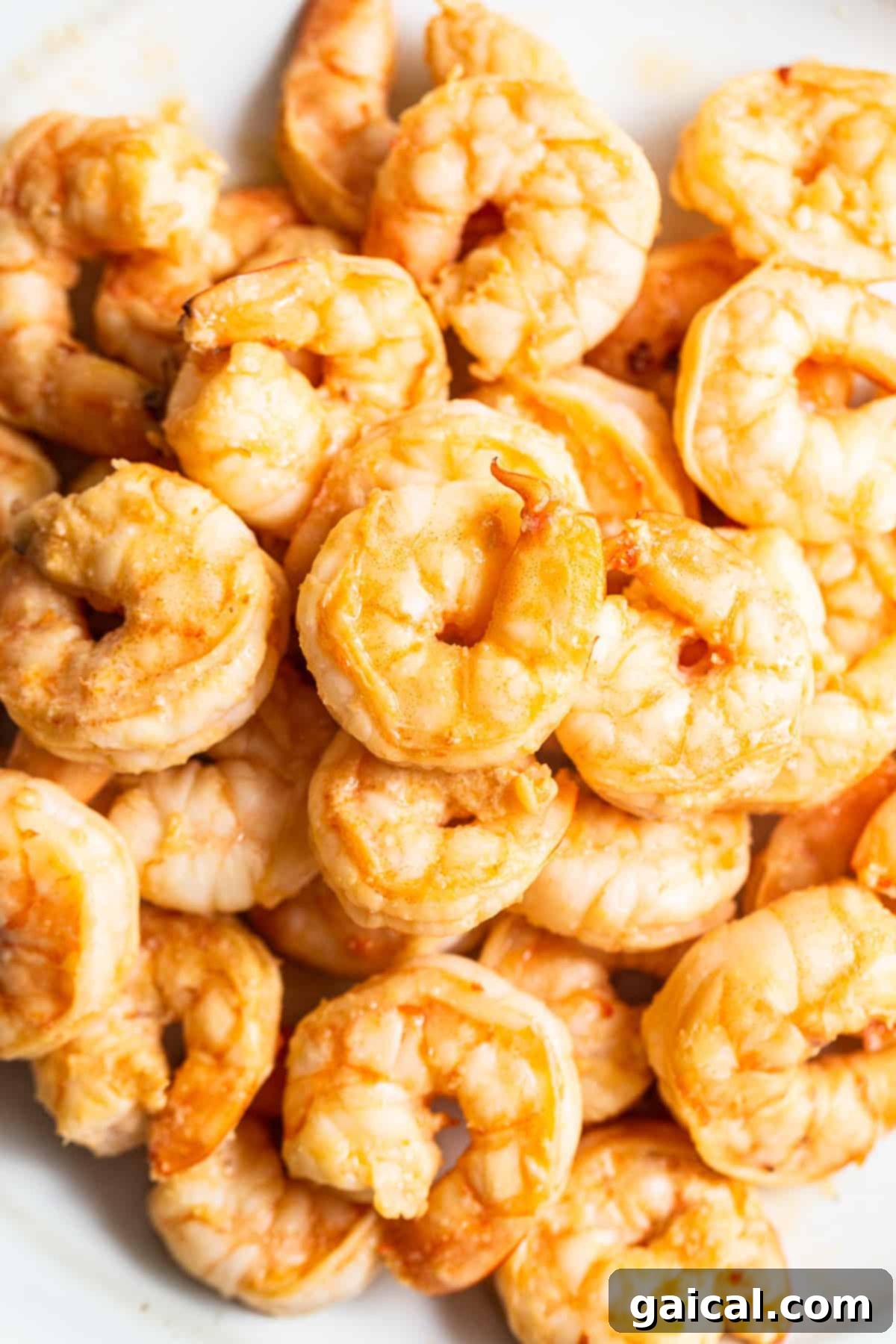 Succulent Cooked Shrimp for Fried Rice Perfectly cooked, plump and pink shrimp, ready to be integrated into the fried rice