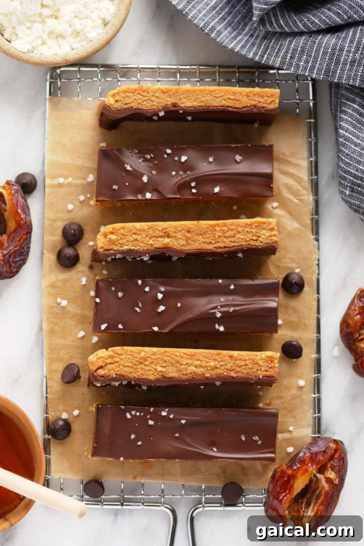 Best Homemade Peanut Butter Protein Bars: A healthy, high-protein snack that tastes like a treat. Delicious peanut butter protein bars neatly arranged on a wire cooling rack, ready to be enjoyed.
