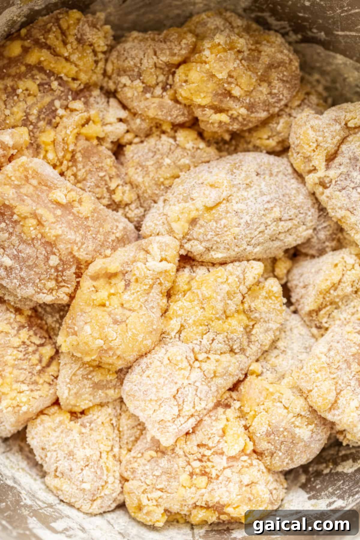 You will love this air fryer honey sesame chicken recipe. It's made with lean chicken breast and a yummy honey sesame sauce and then air-fried to make the chicken super crispy without deep frying. chicken in cornstarch