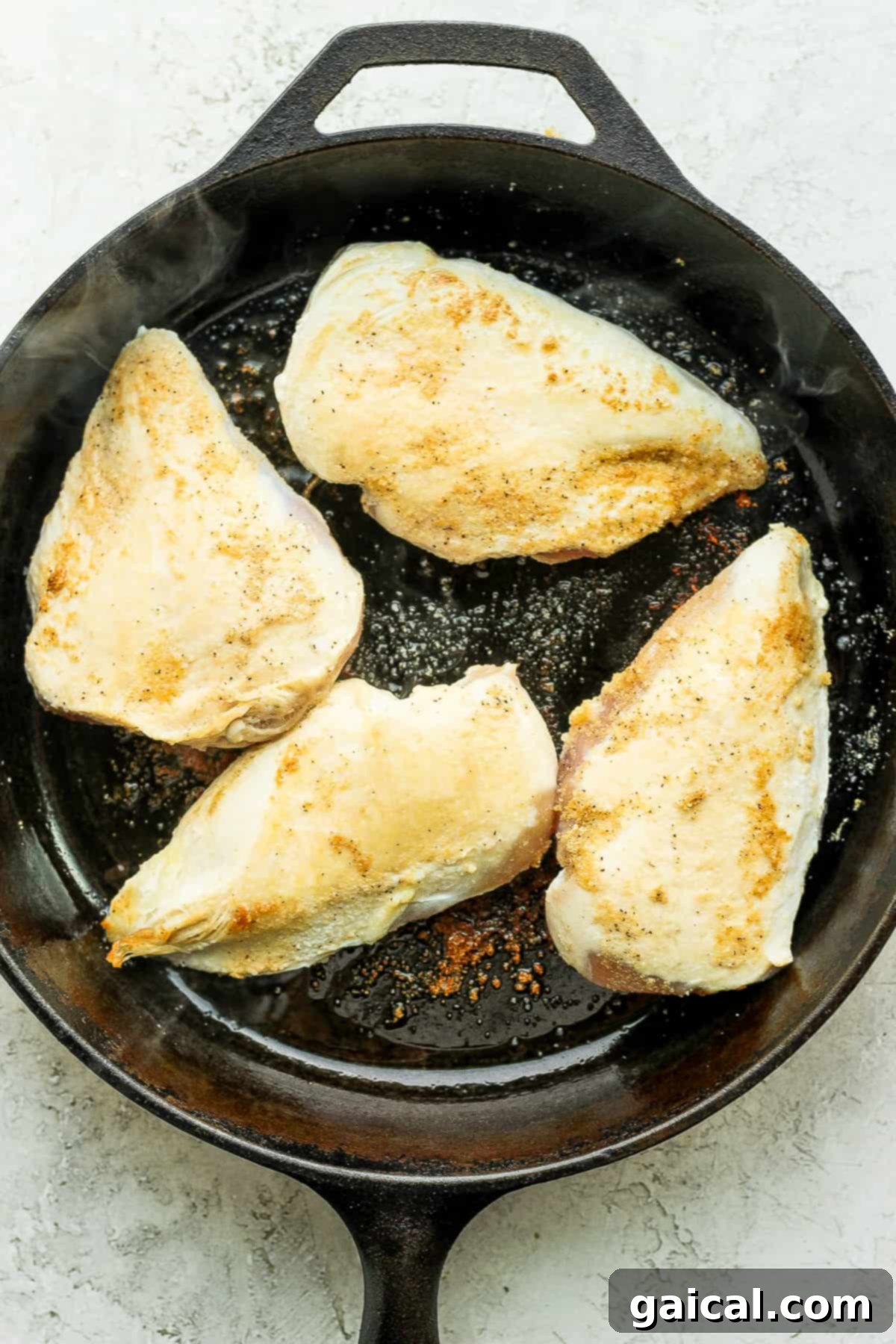 Smoky Chipotle Chicken 3 Searing chicken in a hot pan.