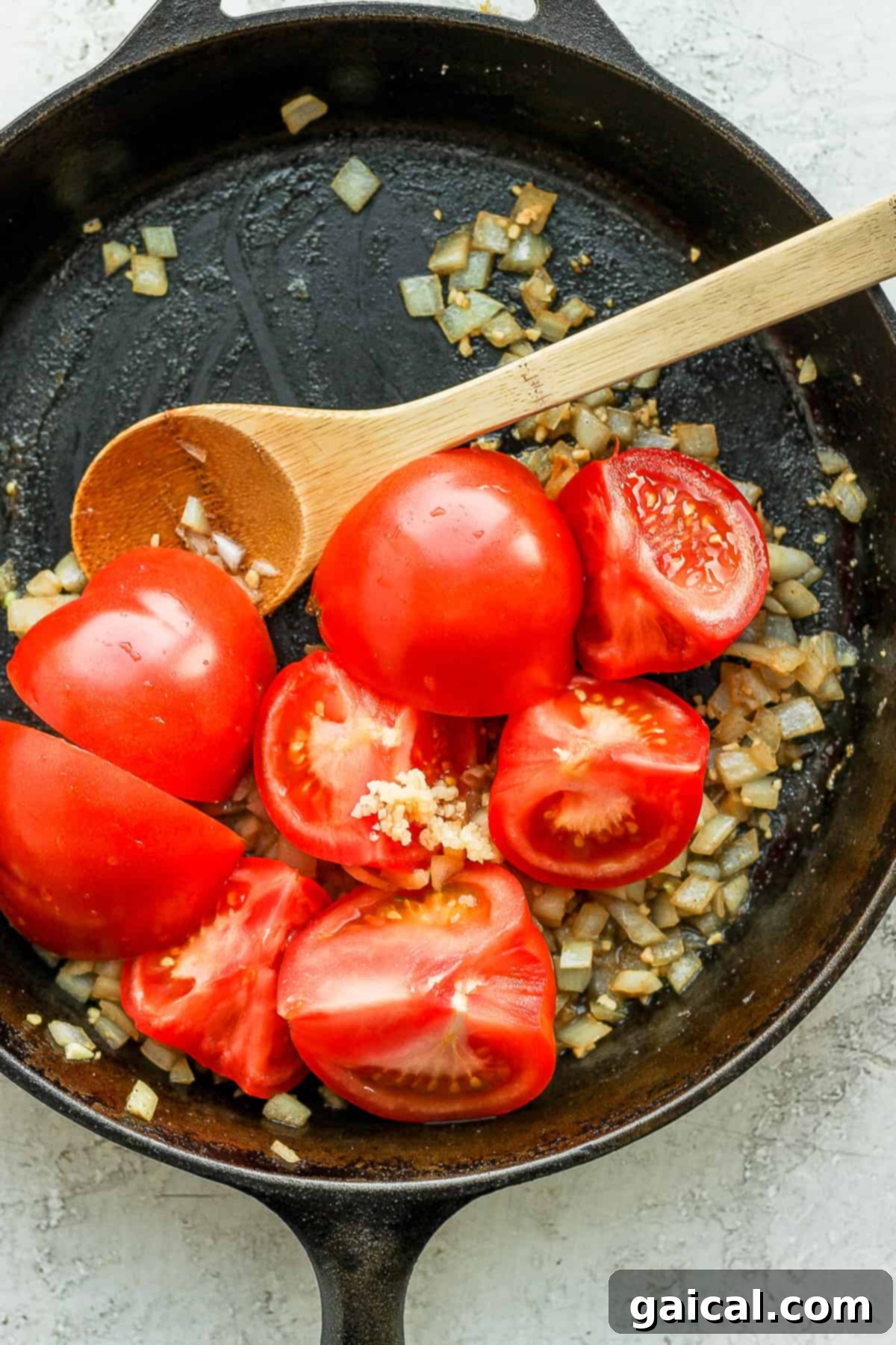 Smoky Chipotle Chicken 6 Sautéing onions, garlic, and tomatoes.