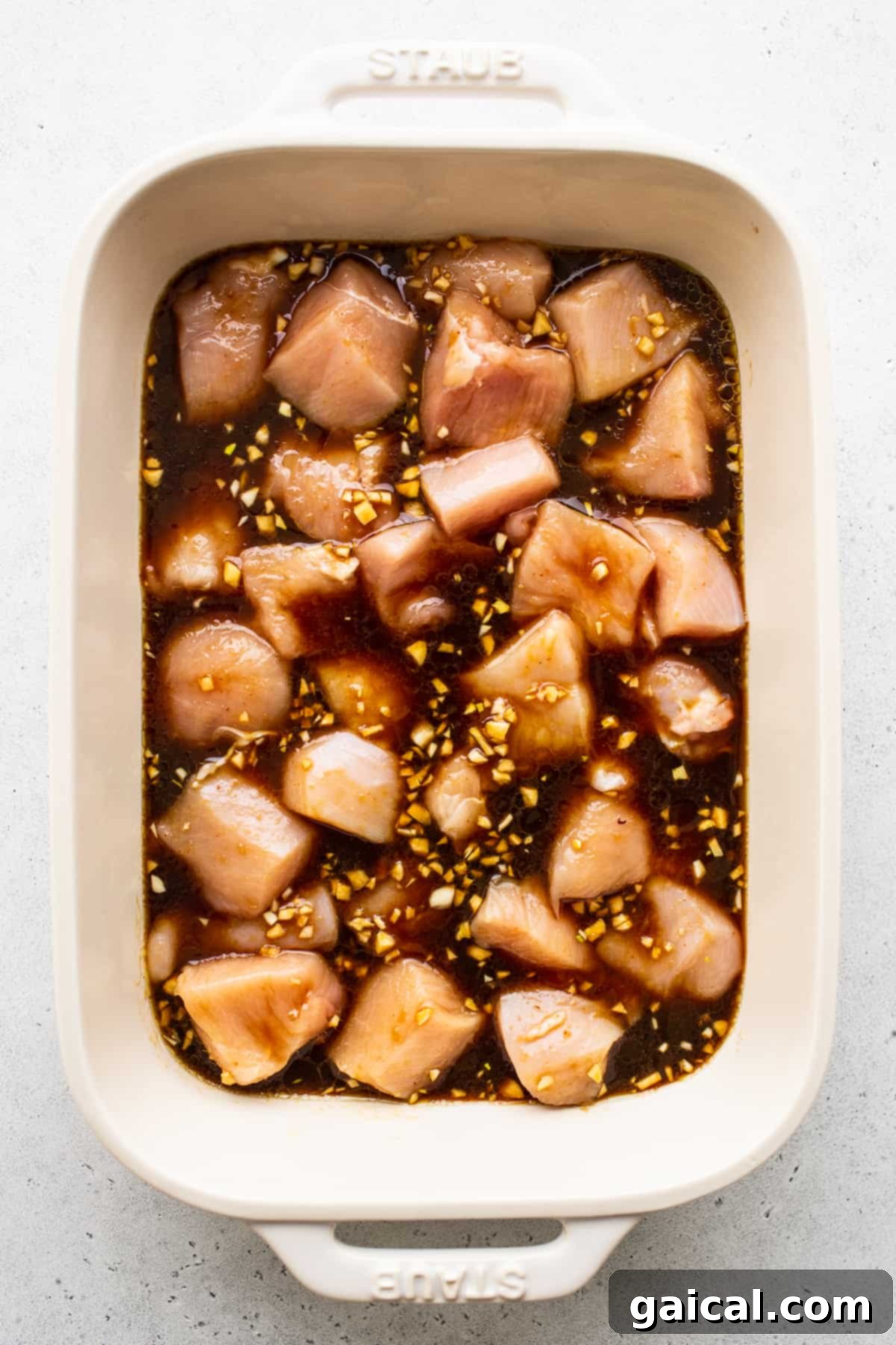 Kaleidoscope Chicken Skewers 5 Cubed chicken marinating in a clear dish, absorbing all the delicious flavors.