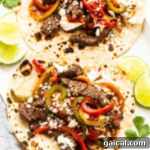 Sizzling Steak Fajitas 12 Assembled steak fajitas on a tortilla.