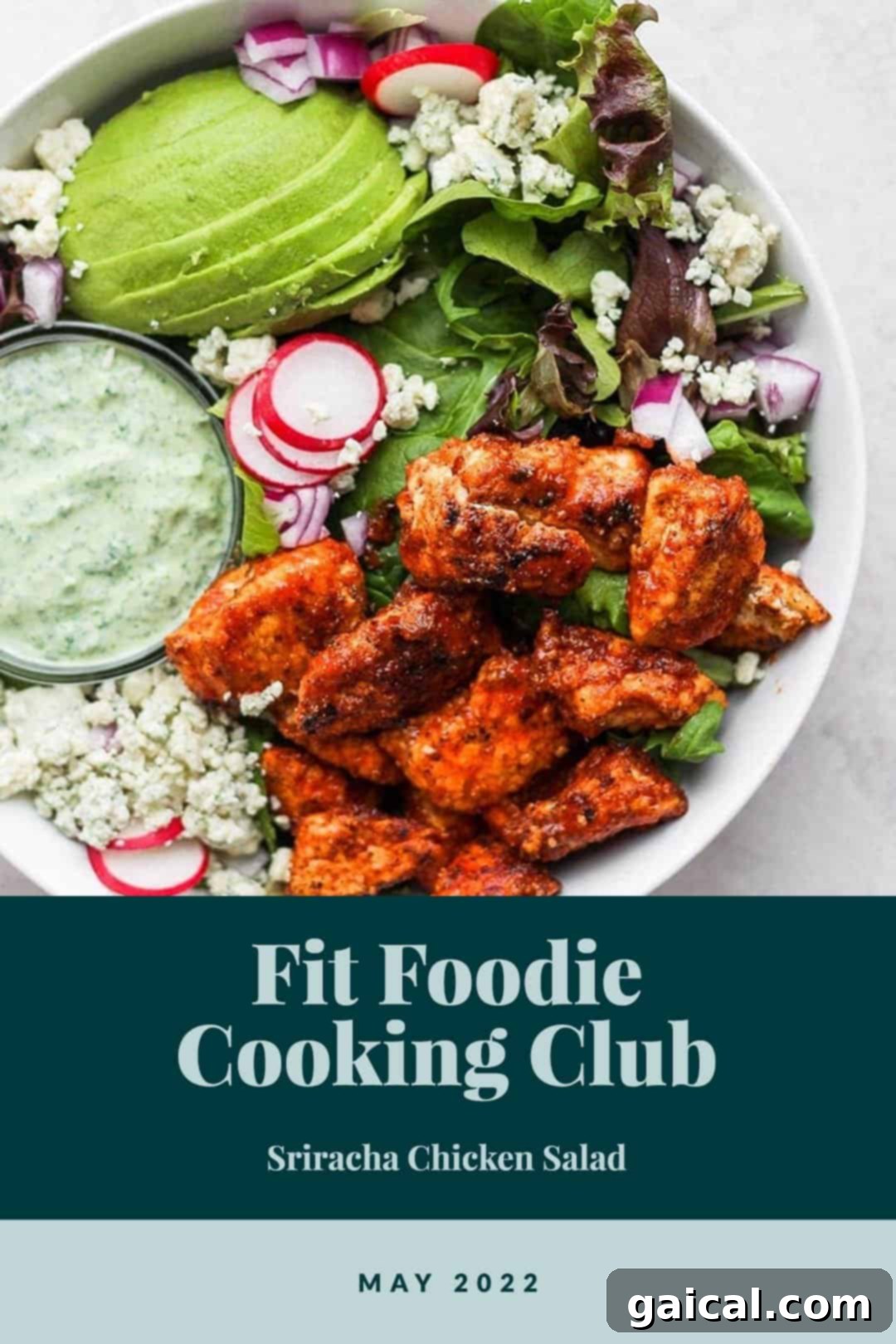 A vibrant Sriracha Chicken Salad in a bowl, featuring crispy chicken pieces, mixed greens, and a creamy dressing drizzle.