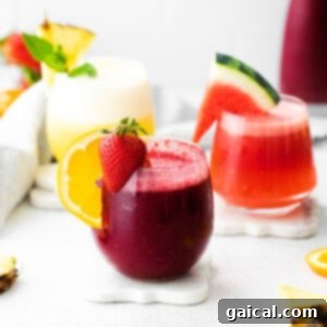 Crisp White Wine Refresher 5 Three vibrant wine slushies in elegant glasses, showcasing a refreshing and chilled alternative to wine.
