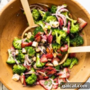Finished strawberry broccoli salad in a bowl.