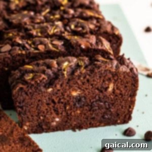 Chocolate zucchini bread, whole loaf, ready to be sliced.