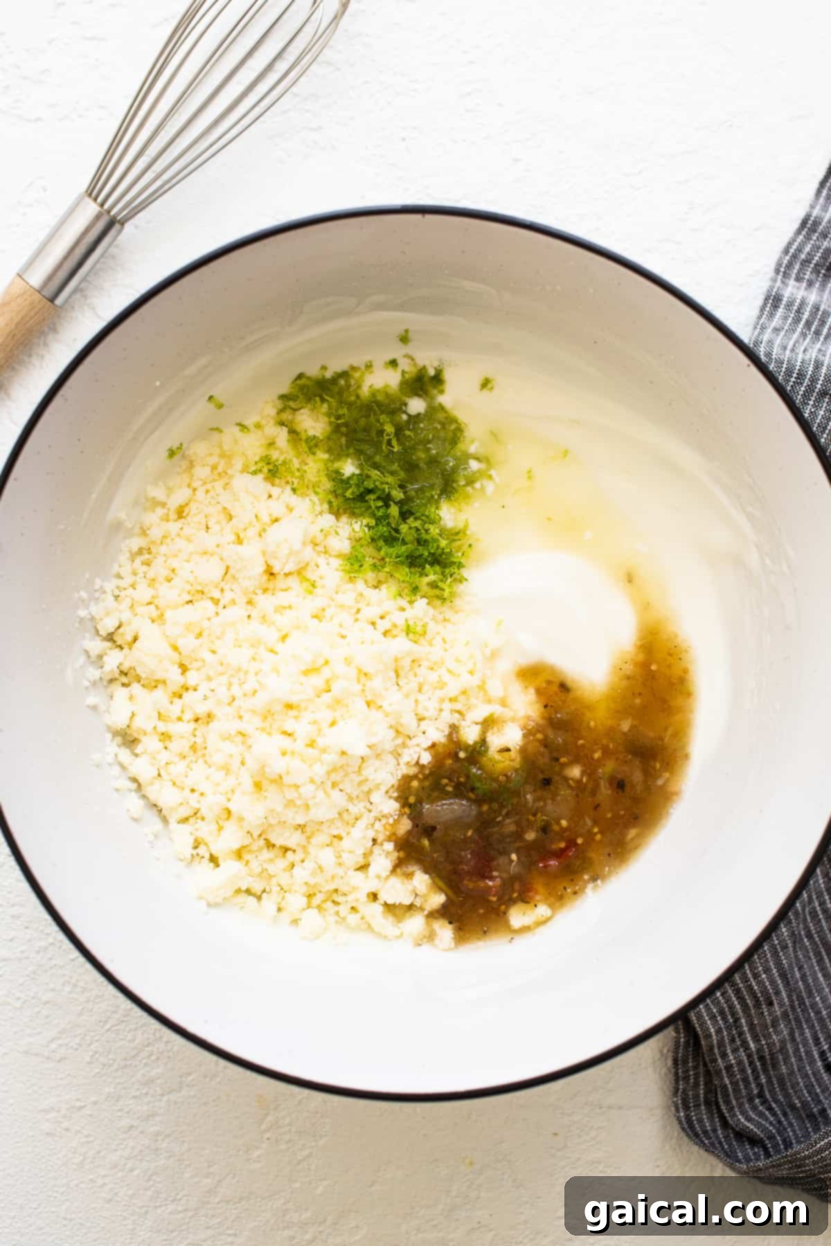 A large bowl filled with Mexican Street Corn Pasta Salad, showcasing the pasta, corn, bell peppers, and creamy dressing.