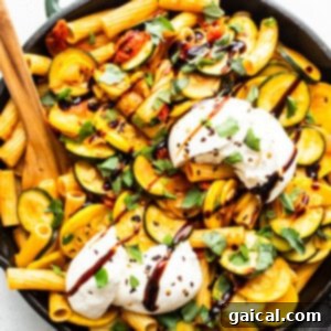 Summer squash pasta in a cast iron pan, ready to serve.