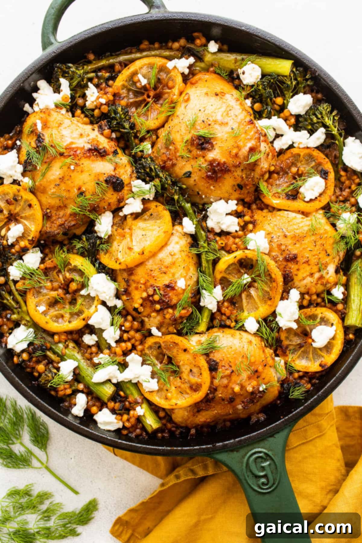 Delicious One-Pot Lemon Chicken Skillet Lemon chicken skillet topped with fresh dill and crumbled goat cheese, ready to serve.