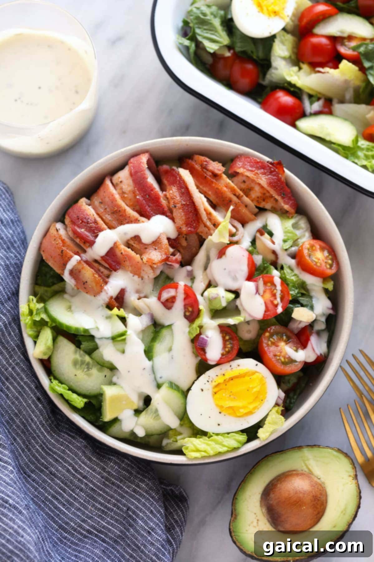 chicken salad with ranch dressing, garnished with fresh herbs
