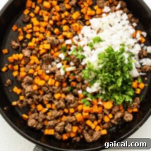 Savory Beef and Sweet Potato Empanadas 15 Ground beef and spices cooking in a skillet.