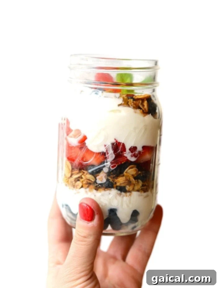 Super Simple Yogurt and Granola Parfaits: Easy Mason Jar Breakfast Layer up Greek yogurt, fresh berries, and your favorite homemade granola for the simplest mason jar parfait breakfast!