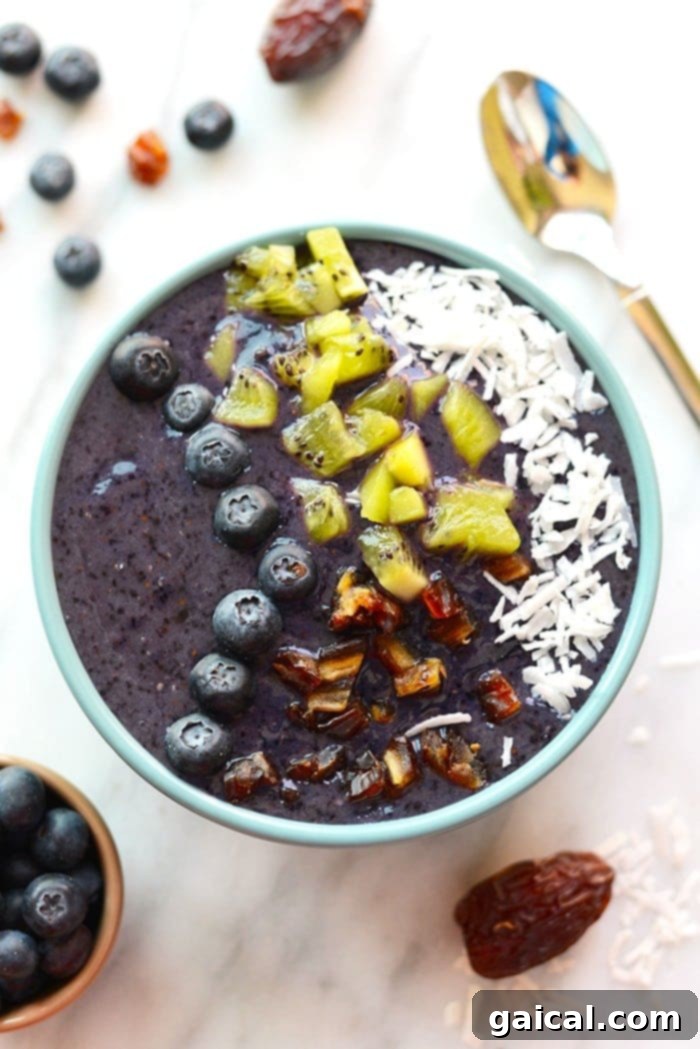 Vibrant Blueberry Smoothie Bowl 4 Smoothies are best eaten with a spoon! Make this thick and delicious Blueberry Date Smoothie Bowl and top it with all your favorite things for a quick breakfast or snack!